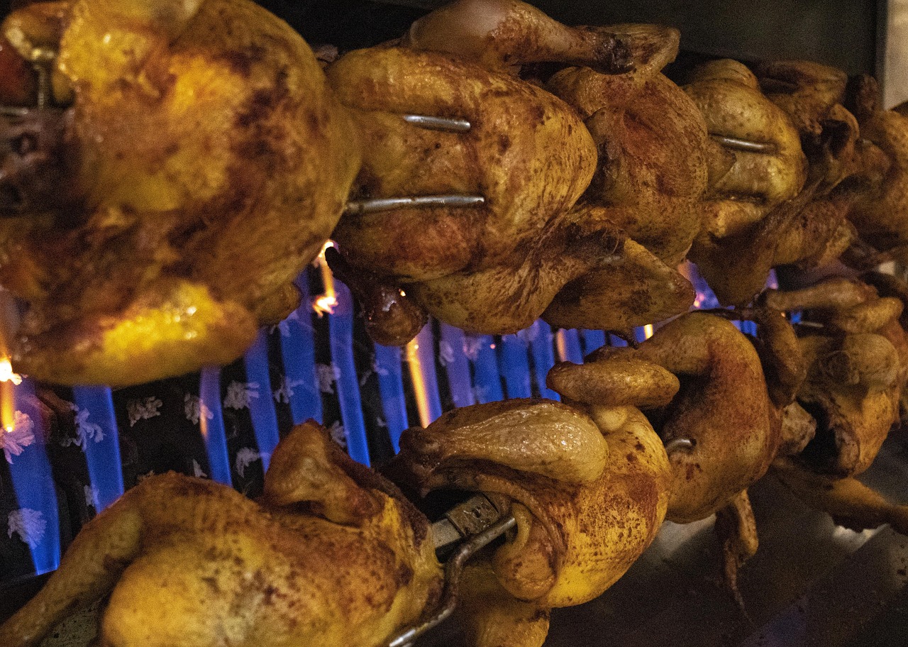 A yakitori grill running on lump charcoal in a working kitchen