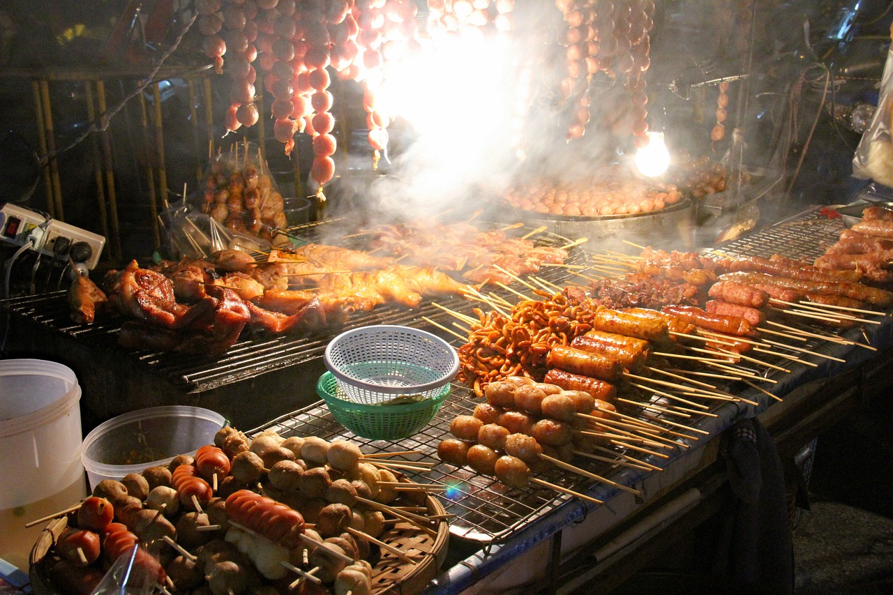A yakitori grill running on lump charcoal in a working kitchen — Charcoal for Restaurants: How Much a Grill Burns