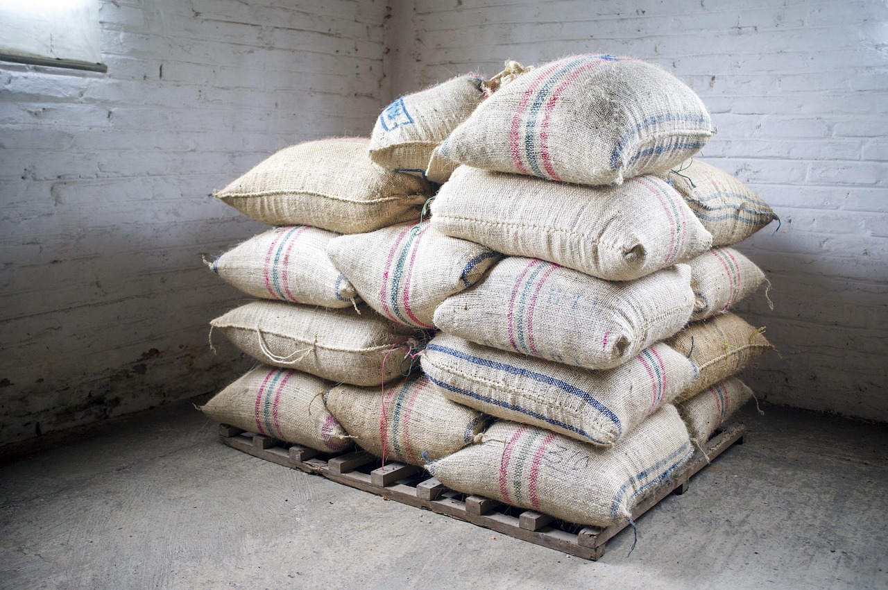 Finished charcoal packed and stacked in the warehouse, ready to ship under a client brand