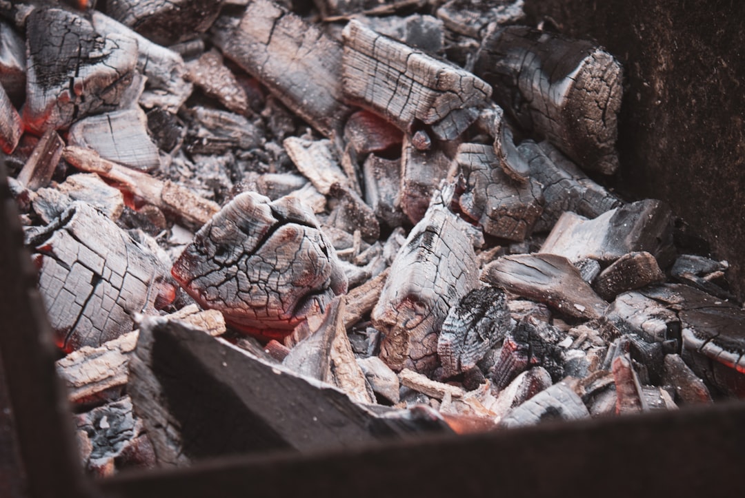Ash building up in the grill, the quiet reason long cooks lose airflow and heat