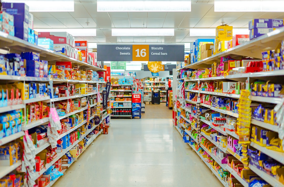 A grocery aisle, the shelf space a private label charcoal brand has to earn