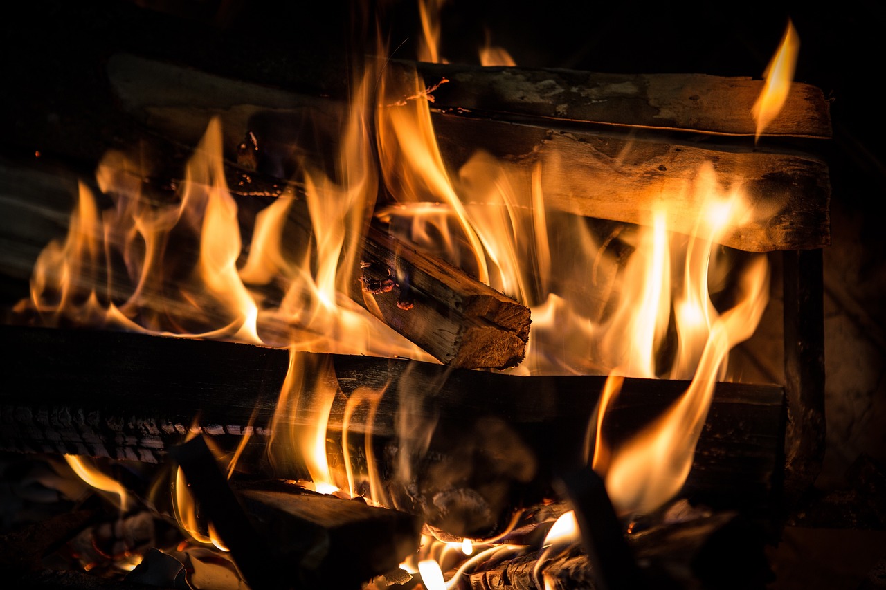 Traditional earth kiln carbonising hardwood at the factory — Is Charcoal Made From Wood? What Changes in the Kiln