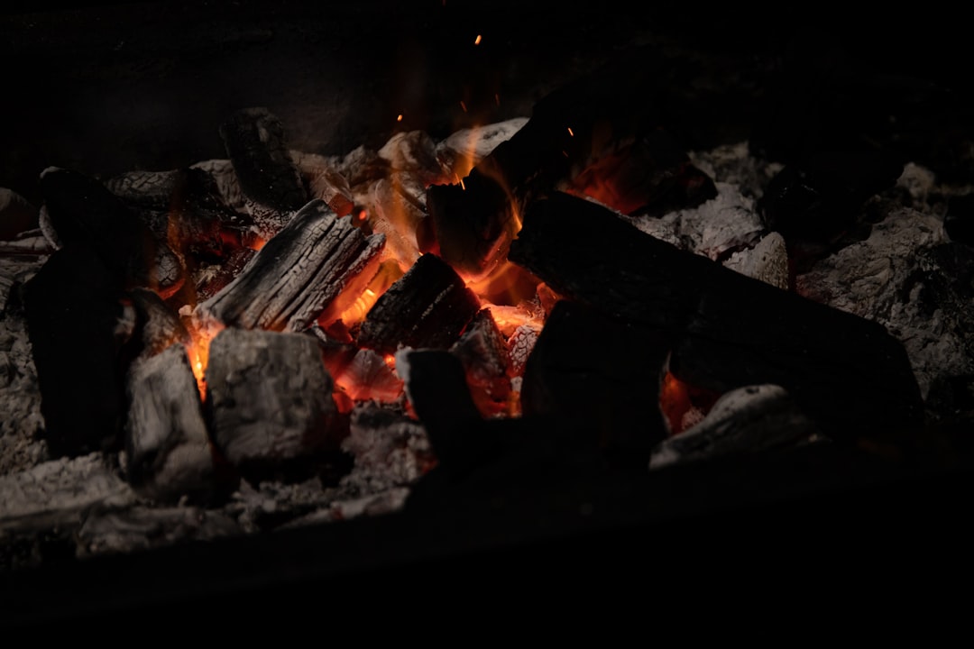 The kiln stage where temperature, not pigment, decides whether charcoal comes out white or black