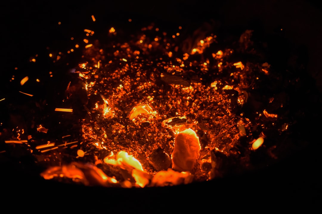 Charcoal driven to glowing heat, the kiln temperature that decides white charcoal versus black charcoal