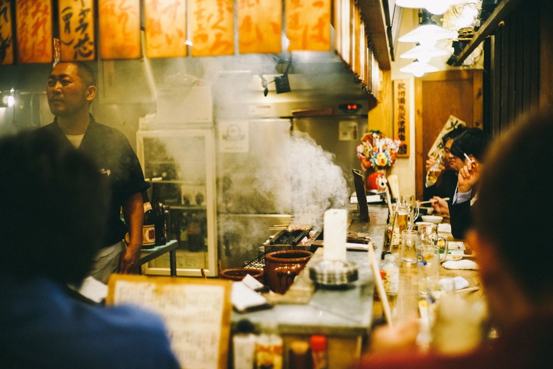 A robata grill running on the same fuel, chosen for radiant heat rather than flame