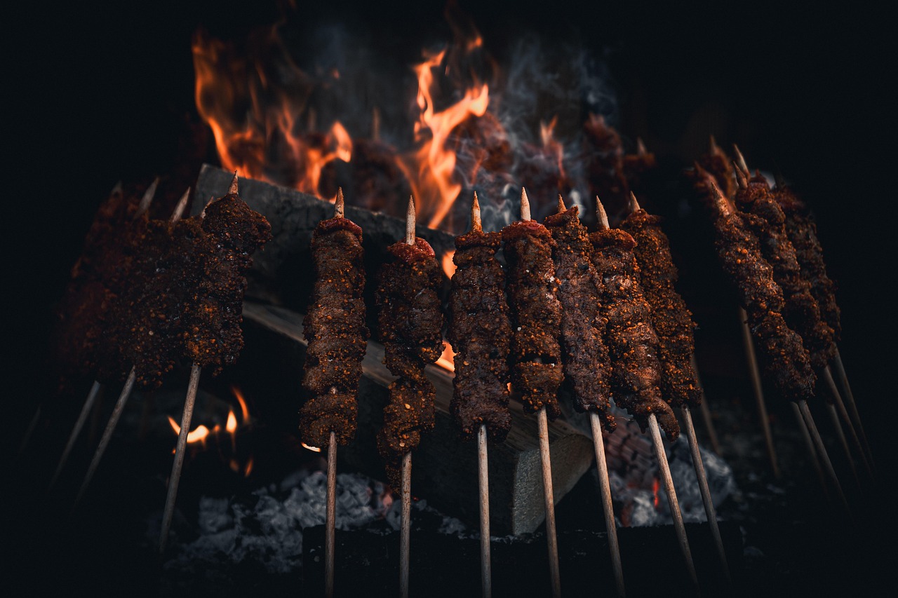 A yakitori grill running on lump charcoal in a working kitchen — Yakitori Grill Setup: Konro, Charcoal, and Layout