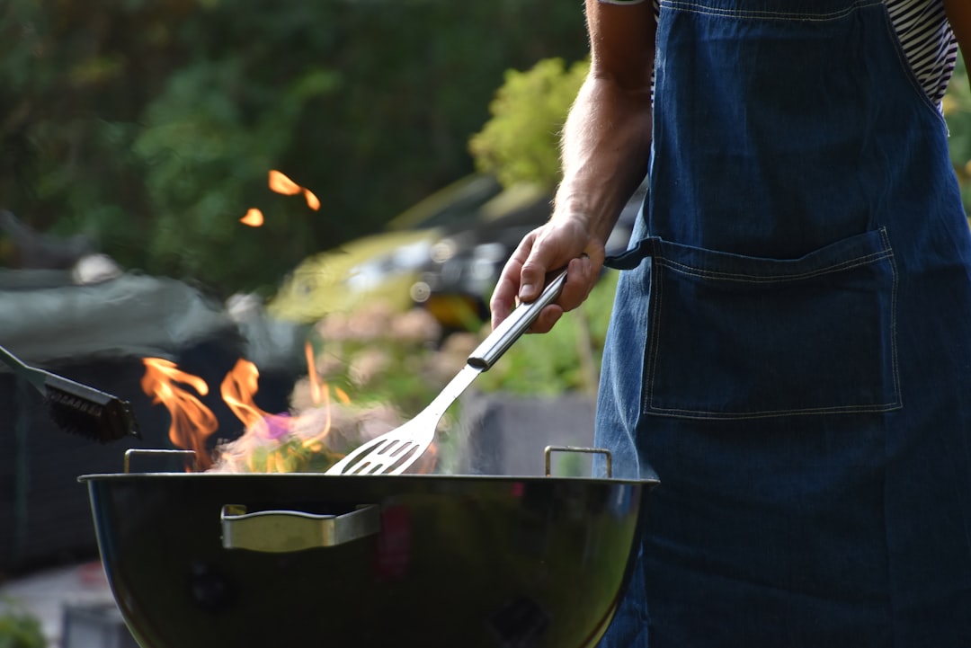 Tending a backyard grill, where the fuel decides how the whole cook behaves