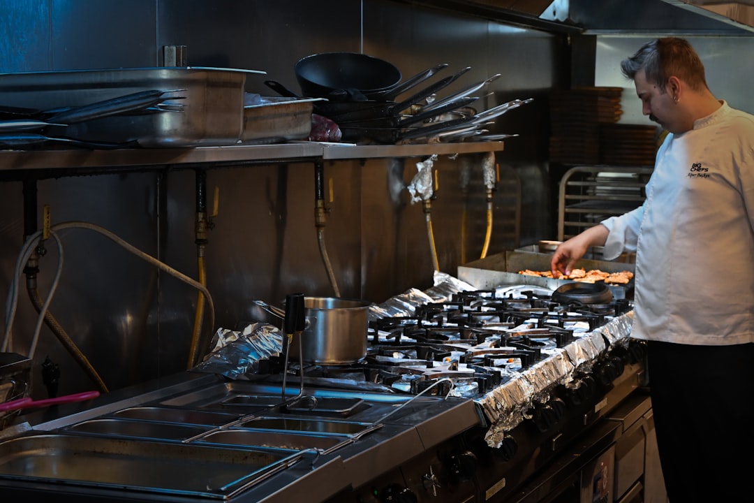 A commercial grill under service, where charcoal has to perform for hours at a time