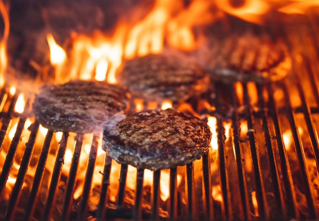 Hardwood charcoal at work on a restaurant grill, holding heat through a service